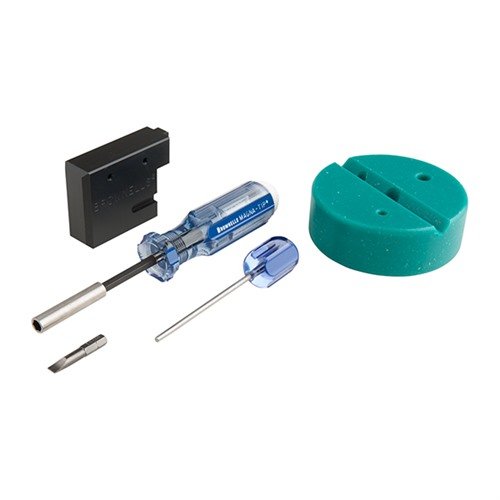 Le kit de remplacement de gâchette AR-15 de BROWNELLS contient tous les outils essentiels pour installer et tester ta gâchette, y compris un tournevis et un bloc de banc.