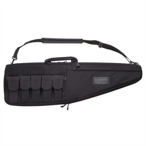 Protège ton arme et ses optiques avec ce TACTICAL RIFLE CASE en nylon Nytaneon, rembourré, avec poches pour chargeurs et possibilité de l'utiliser comme tapis de tir.
