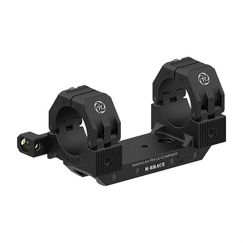 Le M-BRACE Scope Mount offre une conception ingénieuse, une hauteur de 32 mm et un montage robuste, idéal pour les tireurs exigeants. Attention à l'interférence avec la poignée.